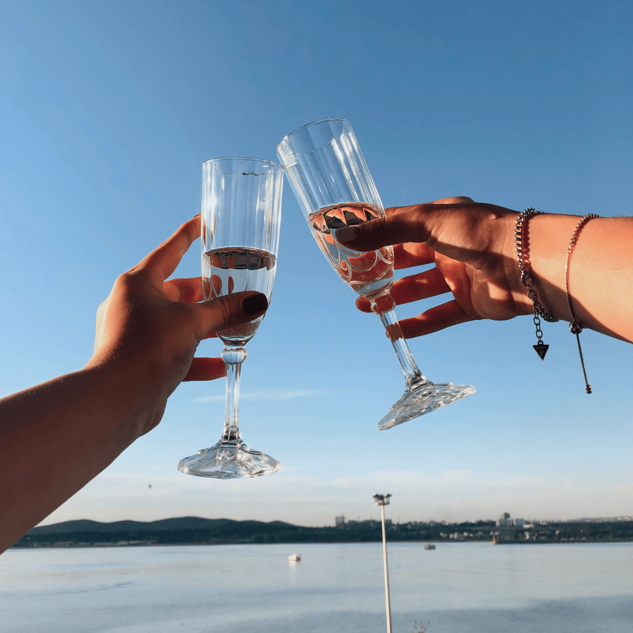 Cheersing Glasses of Champagne | DRINKS